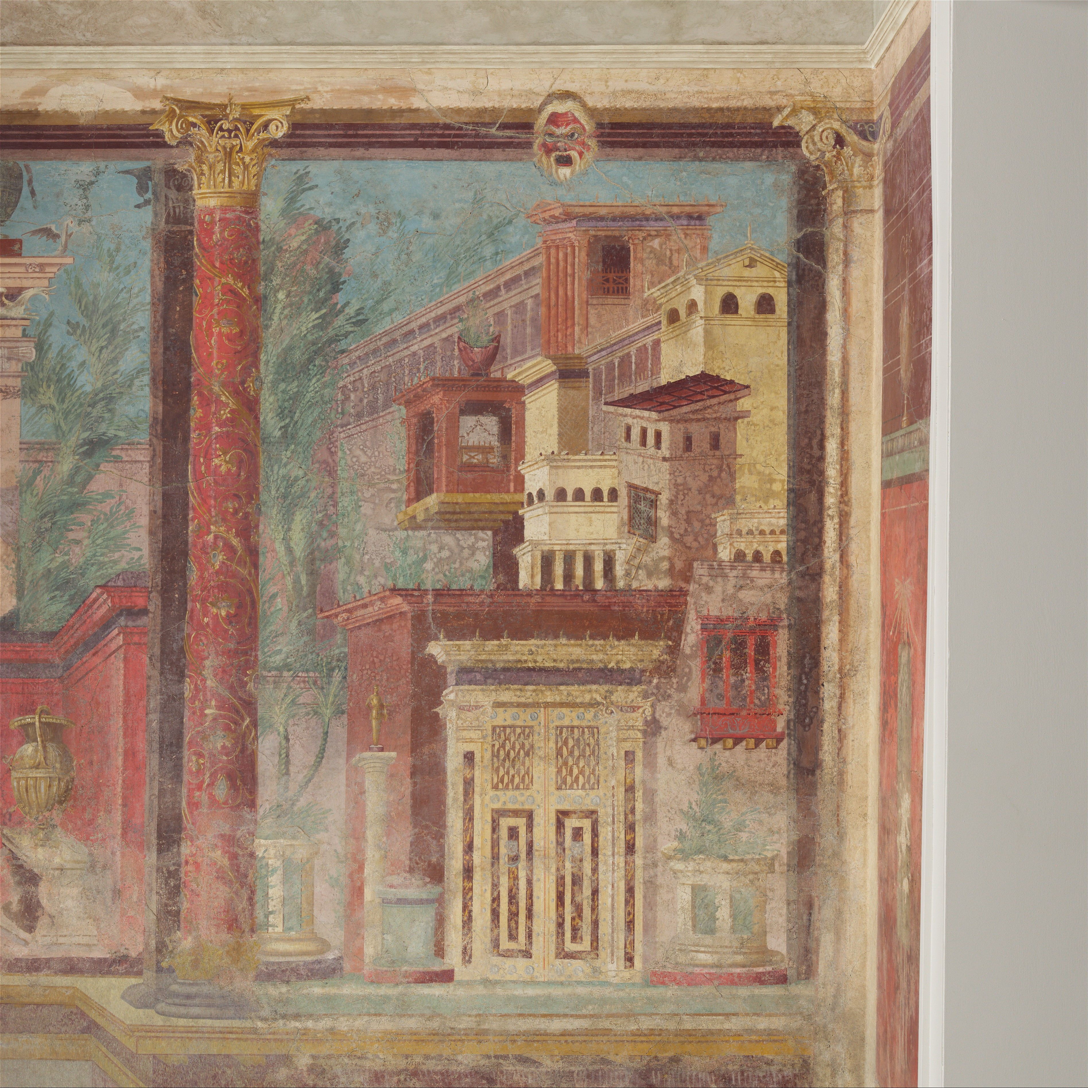 Cubiculum (bedroom) from the Villa of P. Fannius Synistor at Boscoreale: Wall painting of a villa, there is a red column painted on the left and various rectangular buildings on the right. 