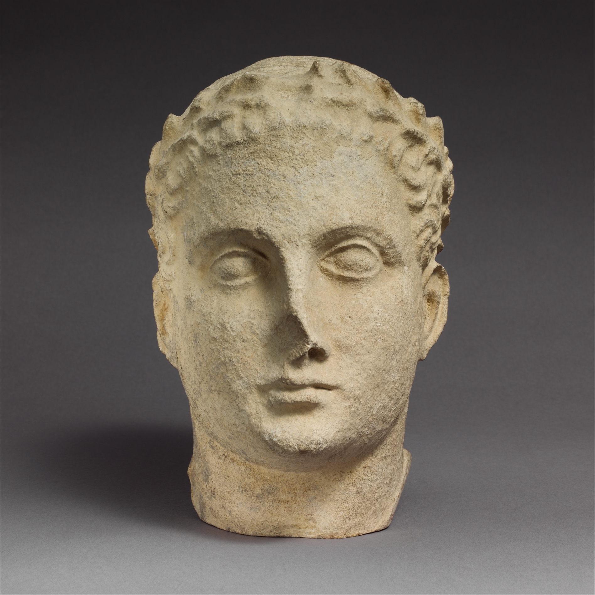 Limestone head of beardless male votary | Cypriot | Hellenistic | The ...