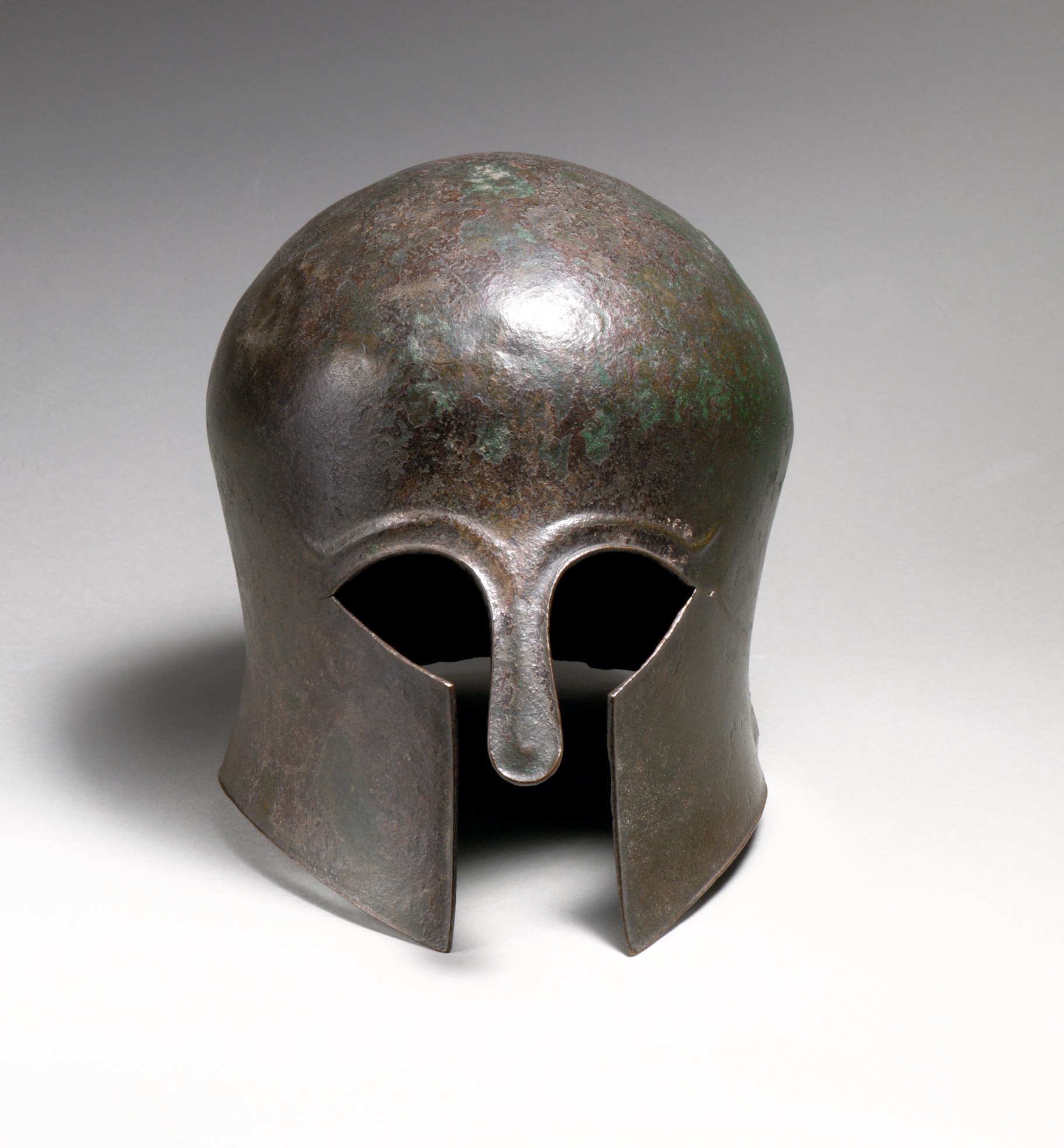 Bronze helmet of the Corinthian type | Greek Archaic | The Museum of Art