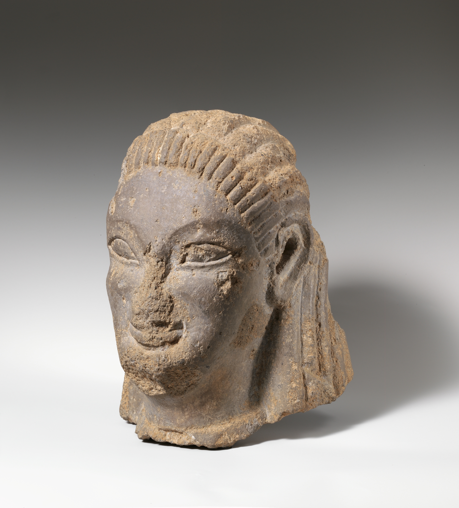 Tufa head of sphinx or siren  Etruscan, probably Vulcian 