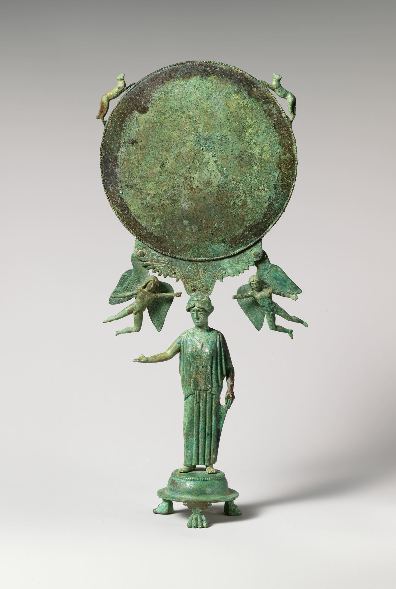 Bronze mirror with a support in the form of a draped woman, Bronze, Greek
