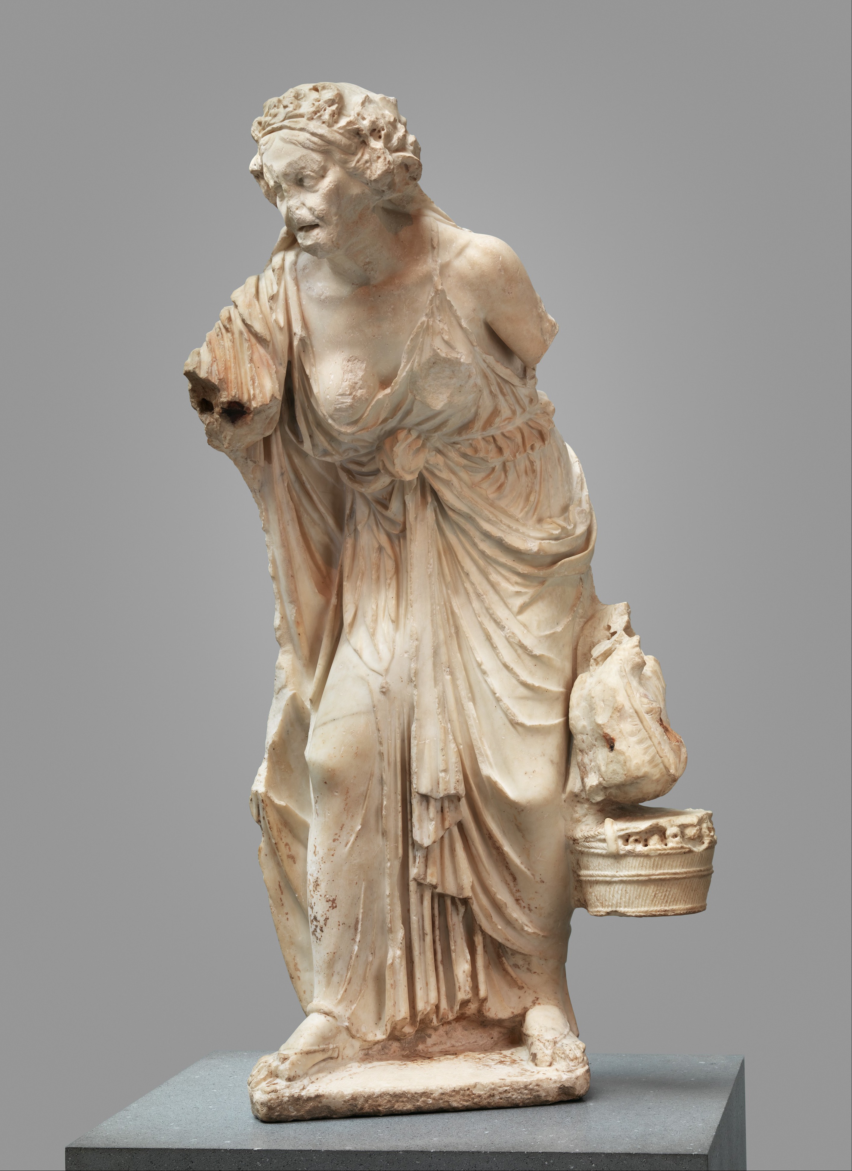 Marble statue of an old woman | Roman | Early Imperial, Julio-Claudian |  The Metropolitan Museum of Art