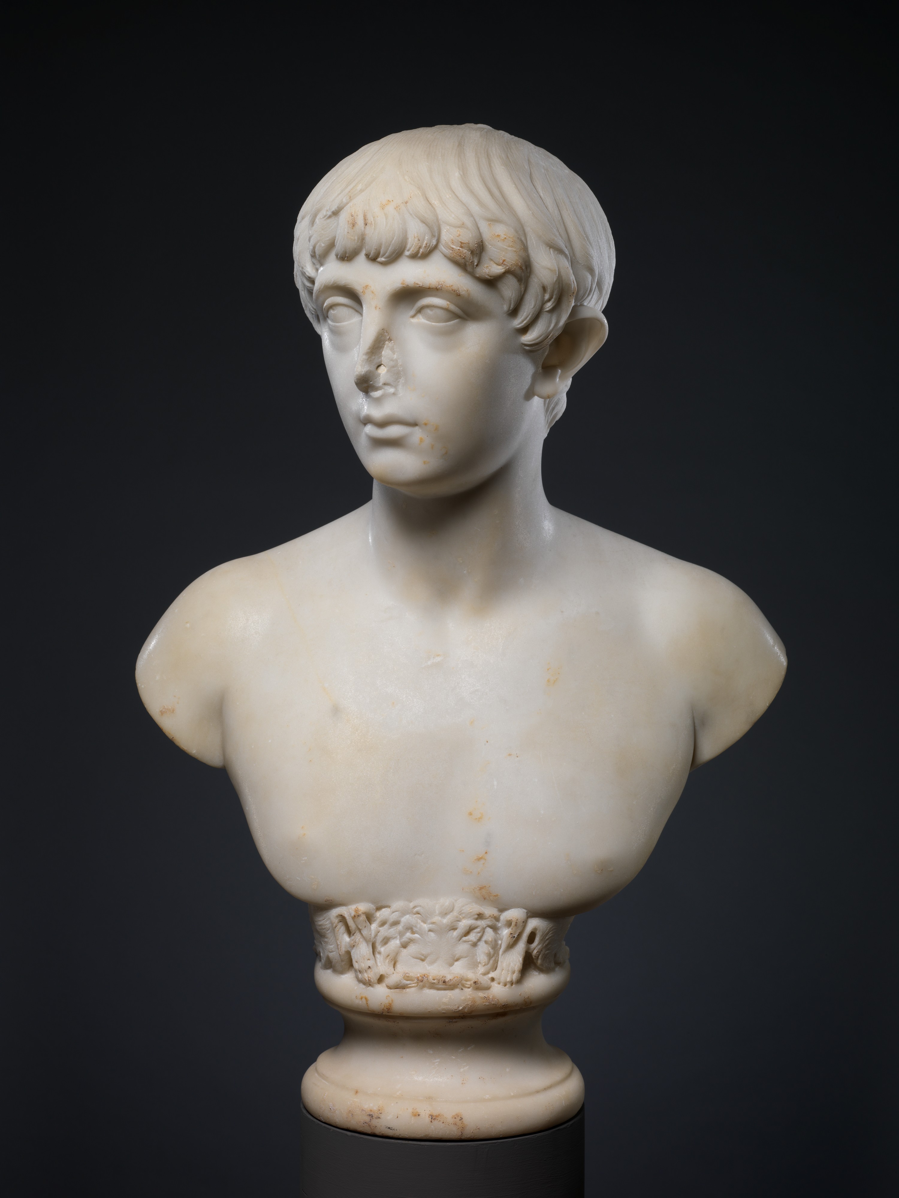 Marble bust of a youth, Roman, Mid Imperial, Hadrianic or Antonine