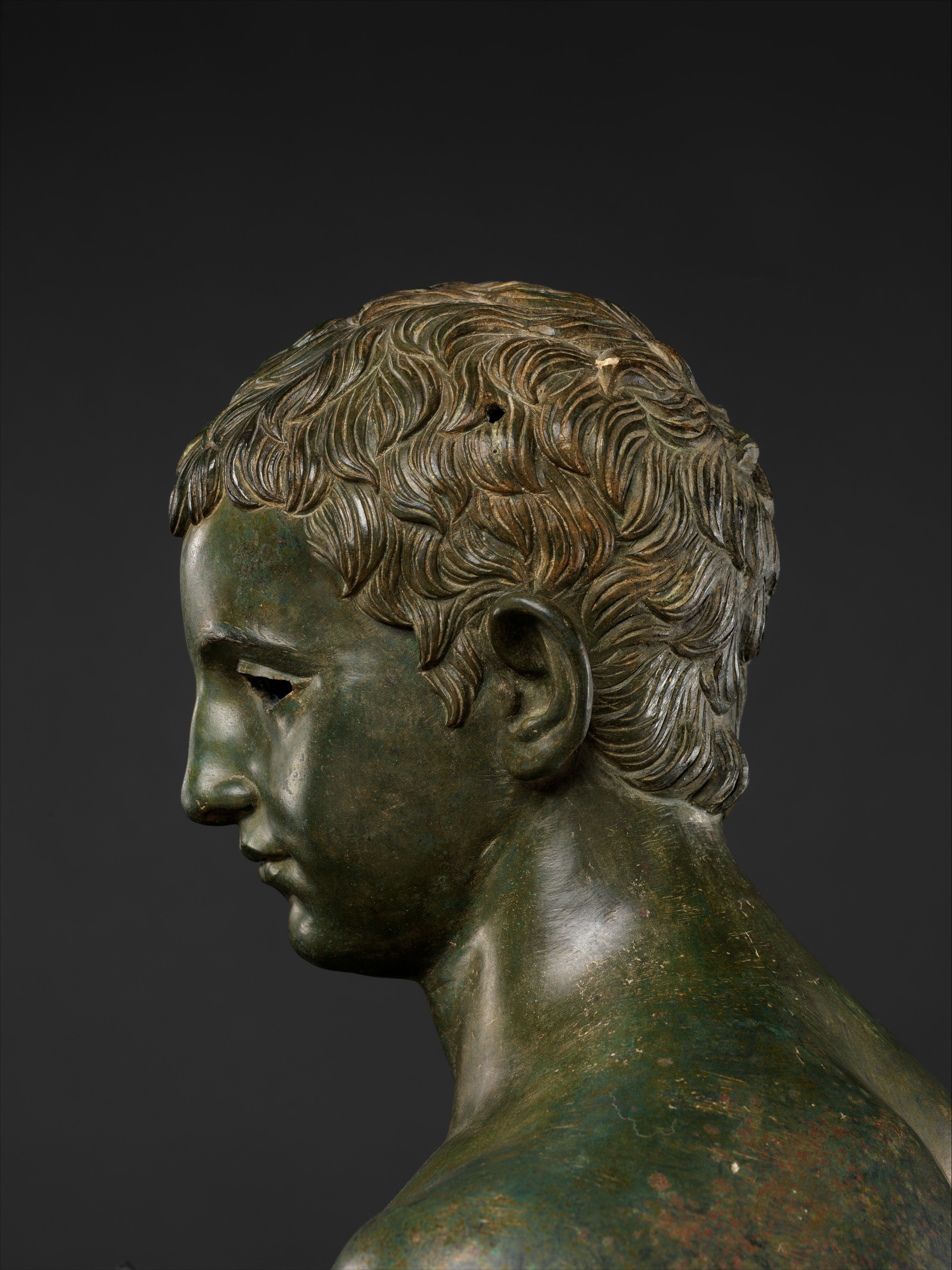 Bronze statue of an aristocratic boy Roman, 27 B.C.-A.D 