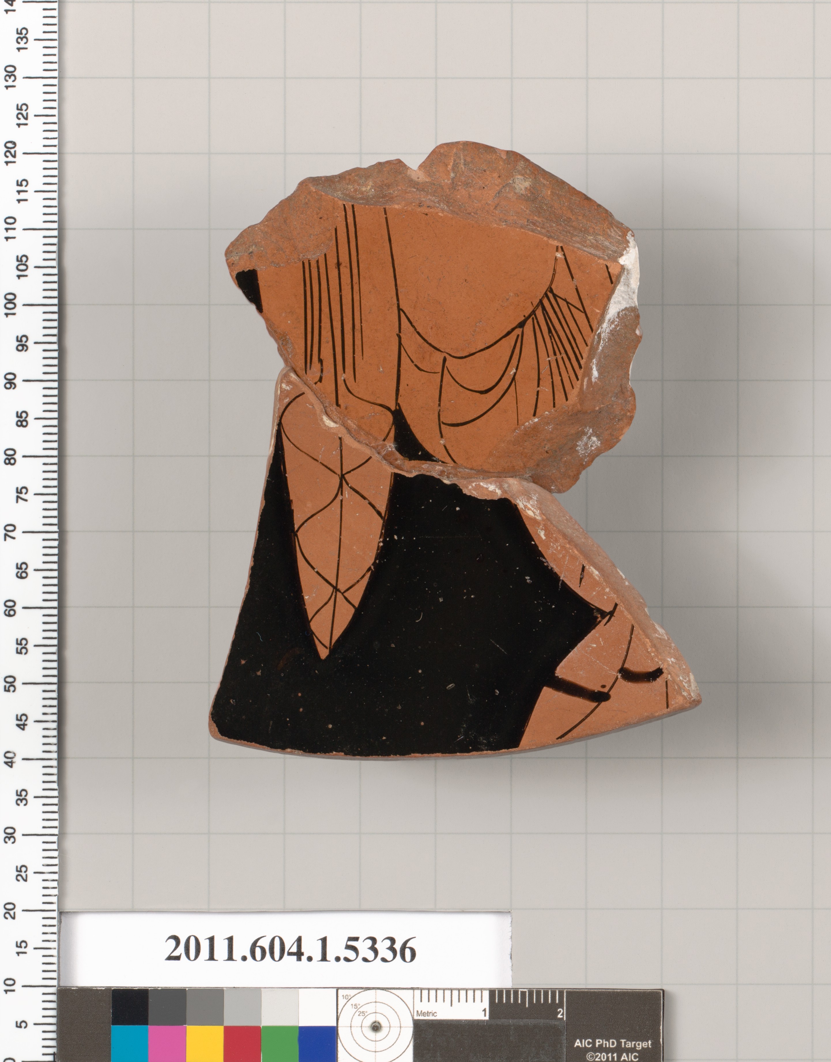 Terracotta fragment of a kylix (drinking cup)