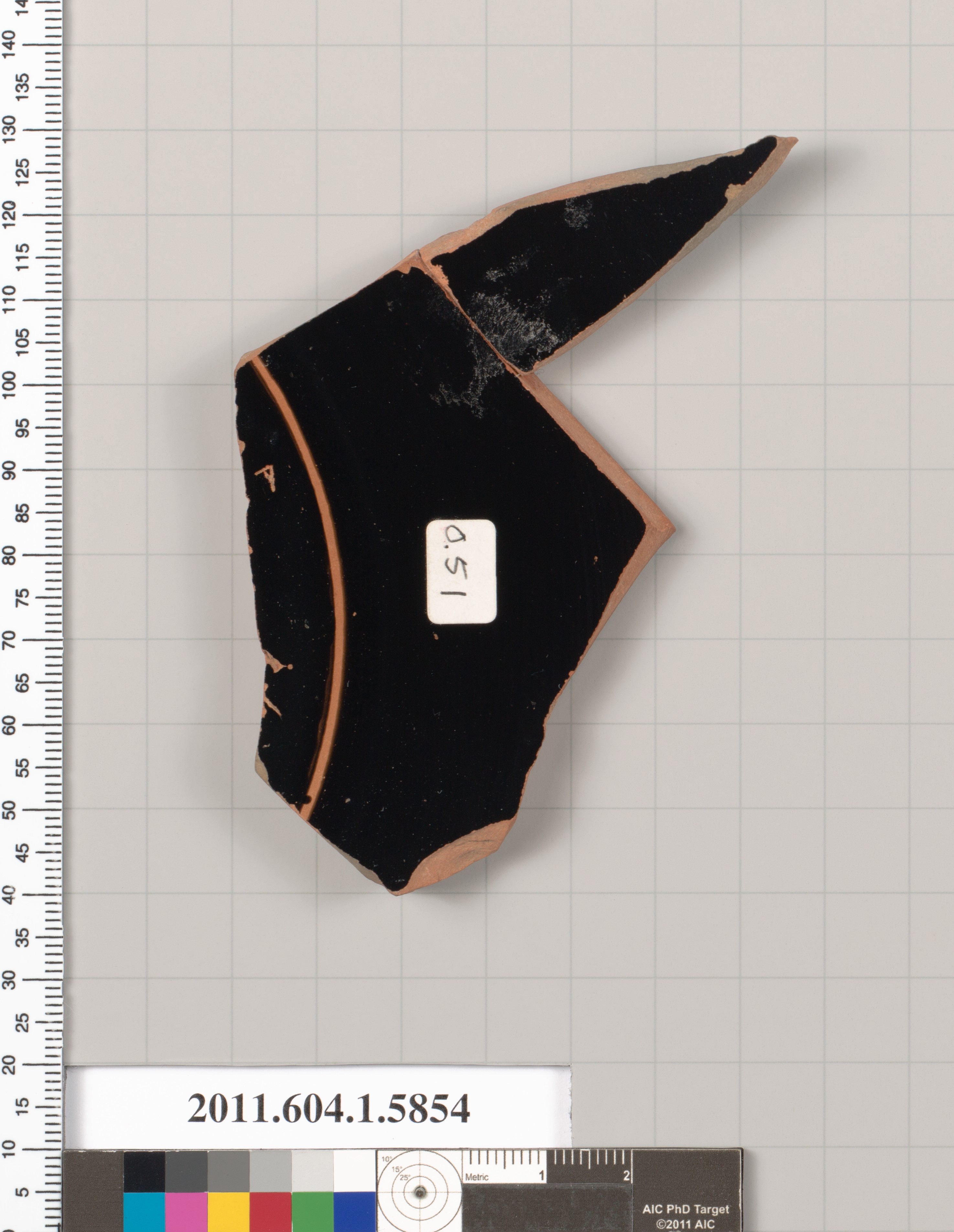 Terracotta fragment of a kylix: eye-cup  (drinking cup)