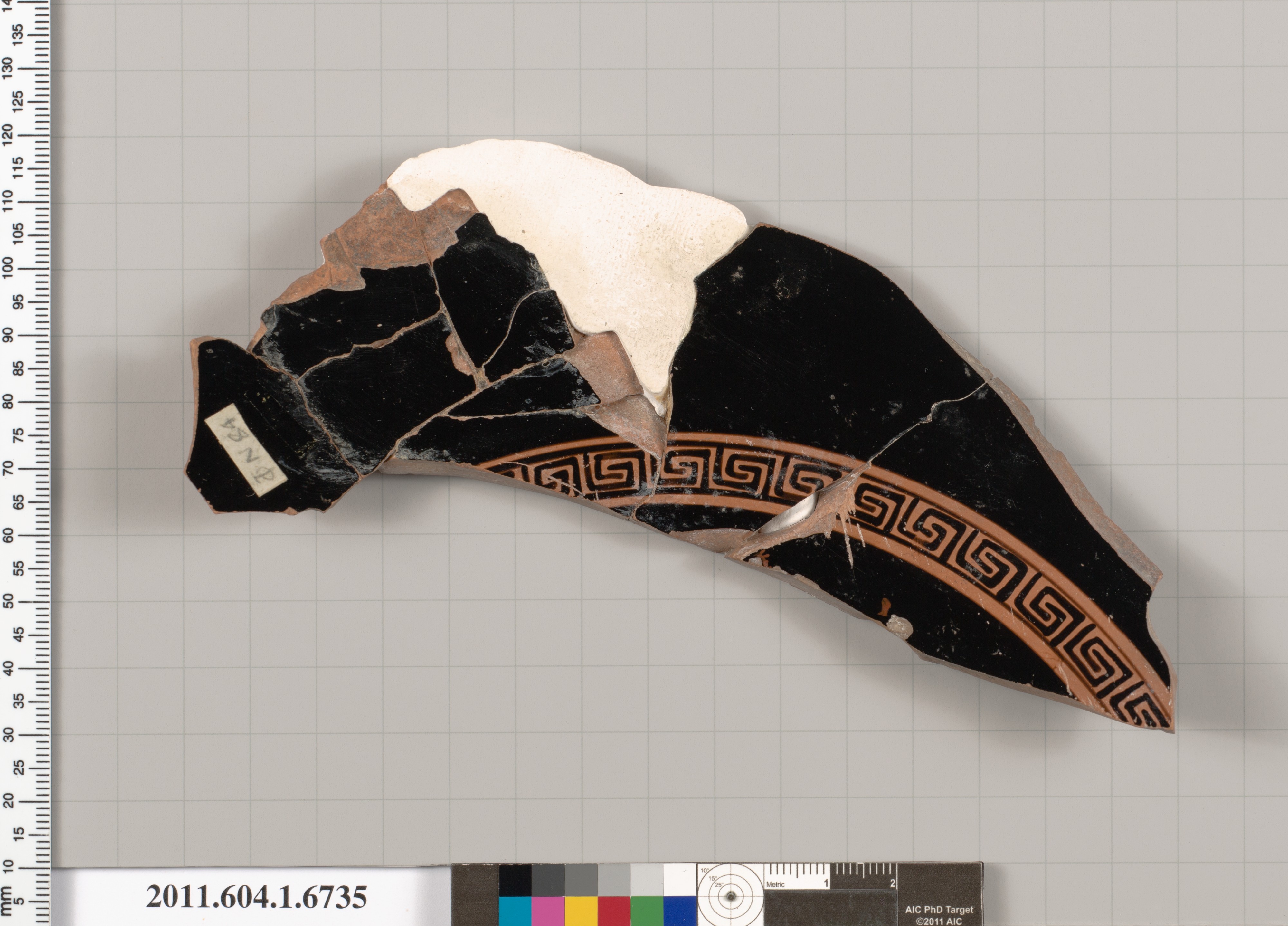 Terracotta fragment of a kylix (drinking cup)