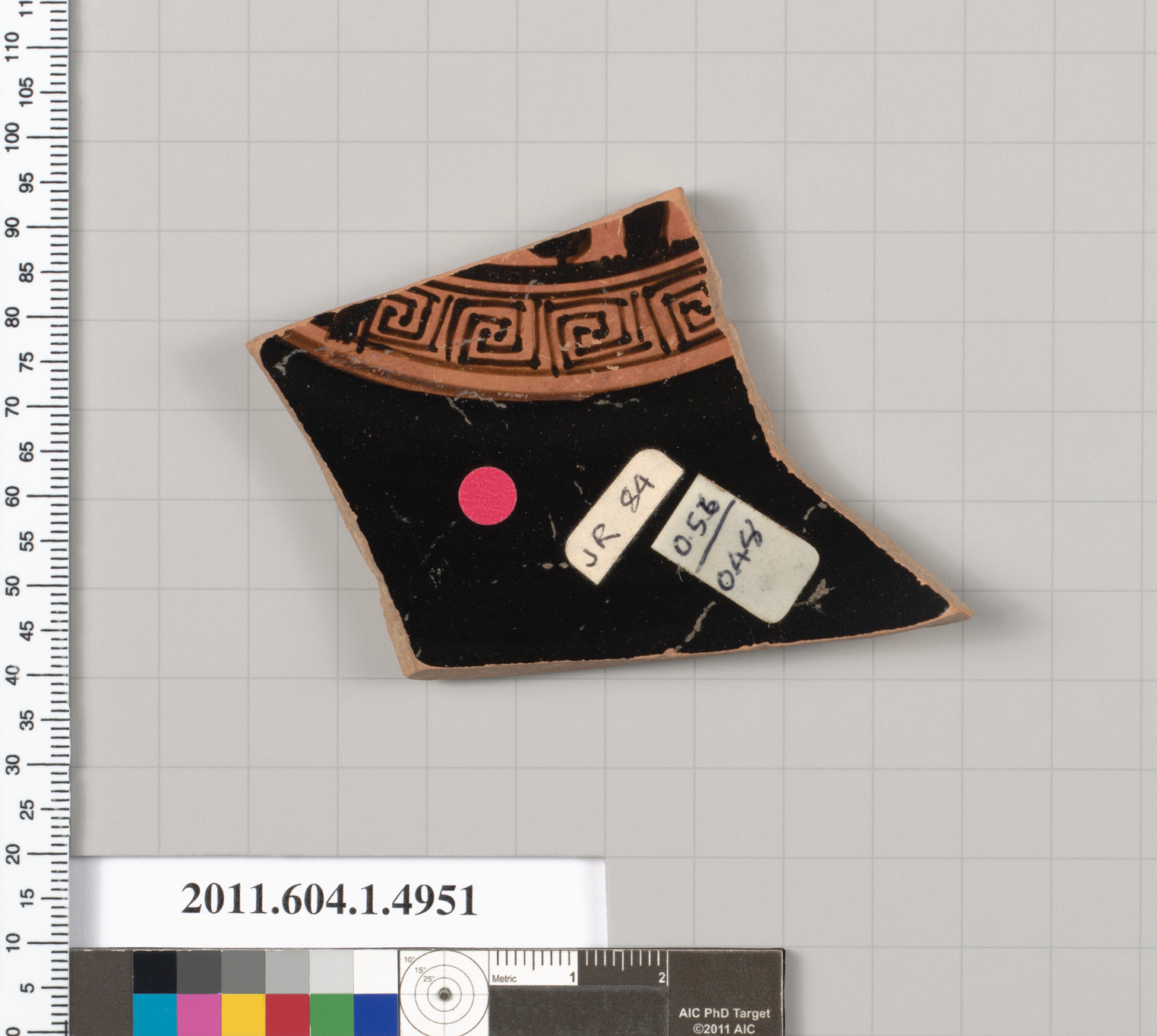 Terracotta fragment of a kylix (drinking cup)