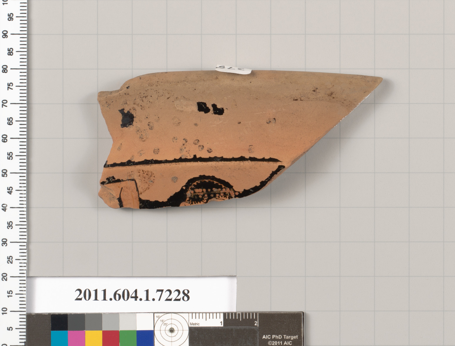 Terracotta rim fragment of a kylix (drinking cup)