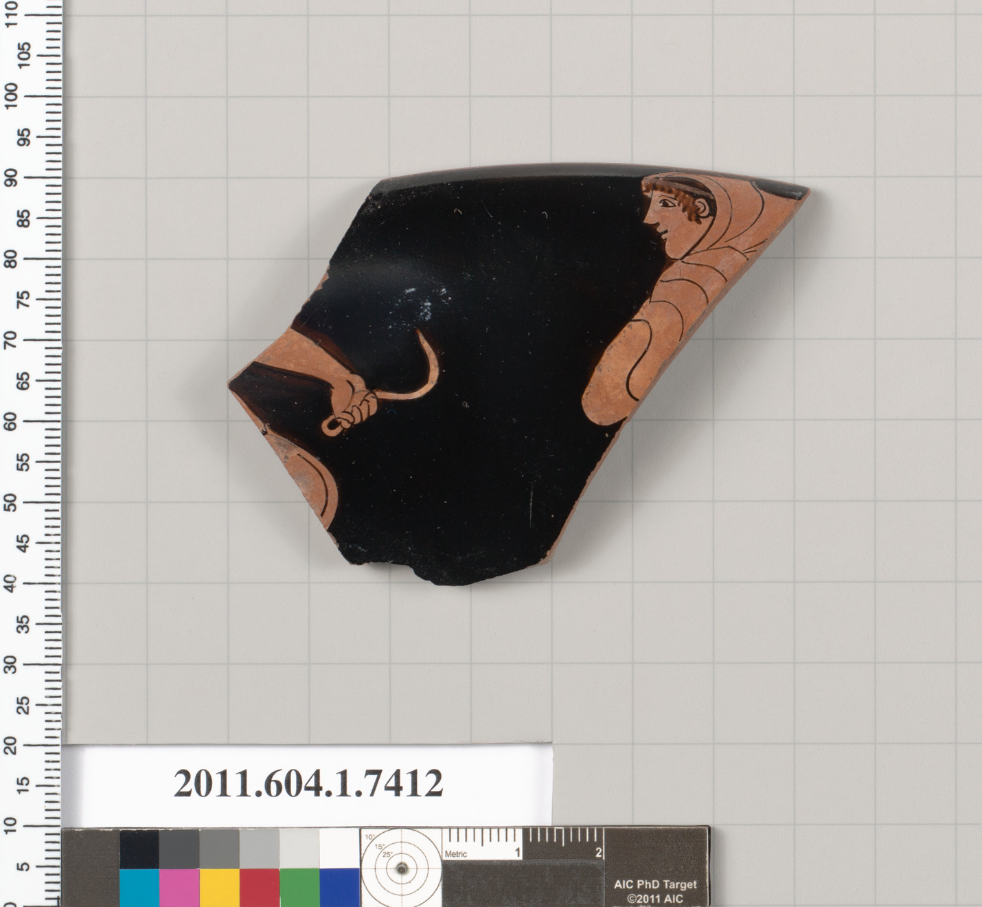 Terracotta rim fragment of a kylix (drinking cup)