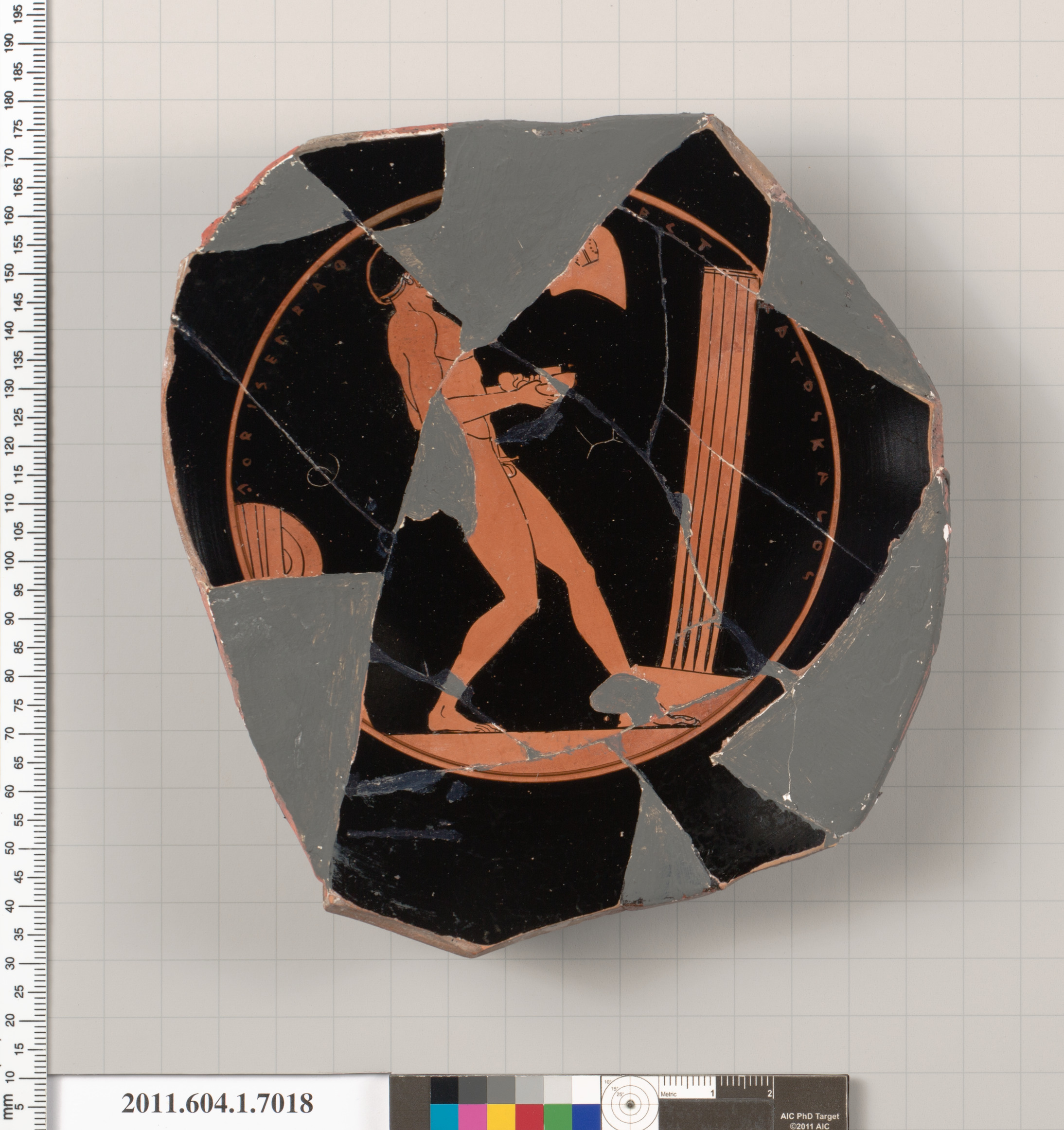 Terracotta fragment of a kylix (drinking cup)