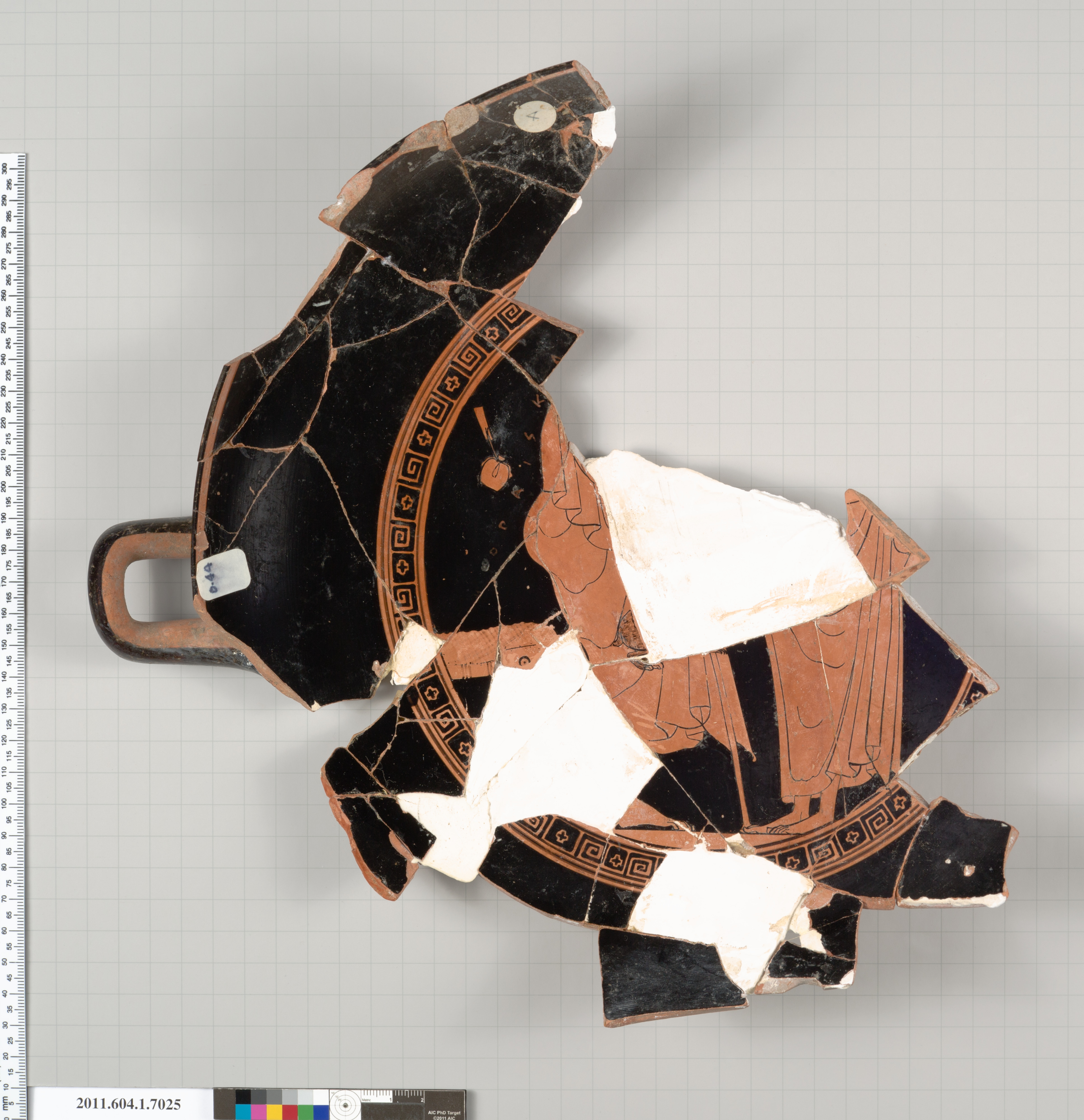 Terracotta fragment of a kylix (drinking cup)