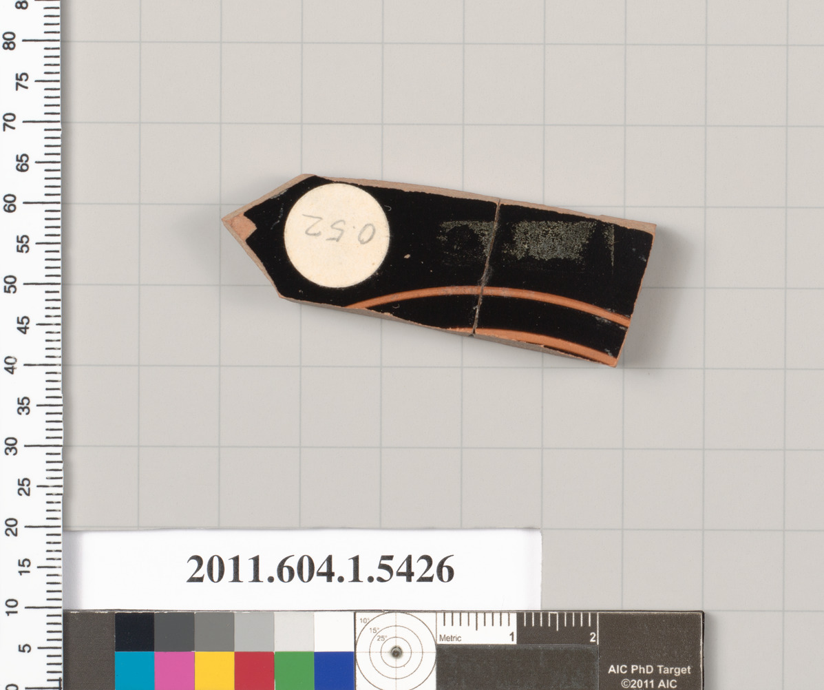 Terracotta fragment of a kylix (drinking cup)