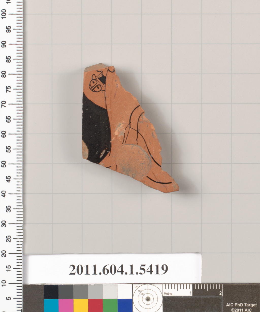 Terracotta fragment of a kylix (drinking cup)