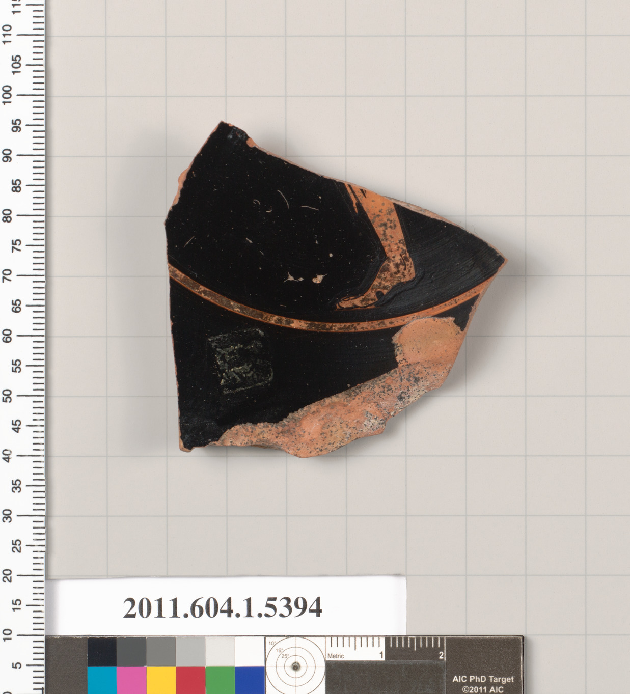 Terracotta fragment of a kylix (drinking cup)