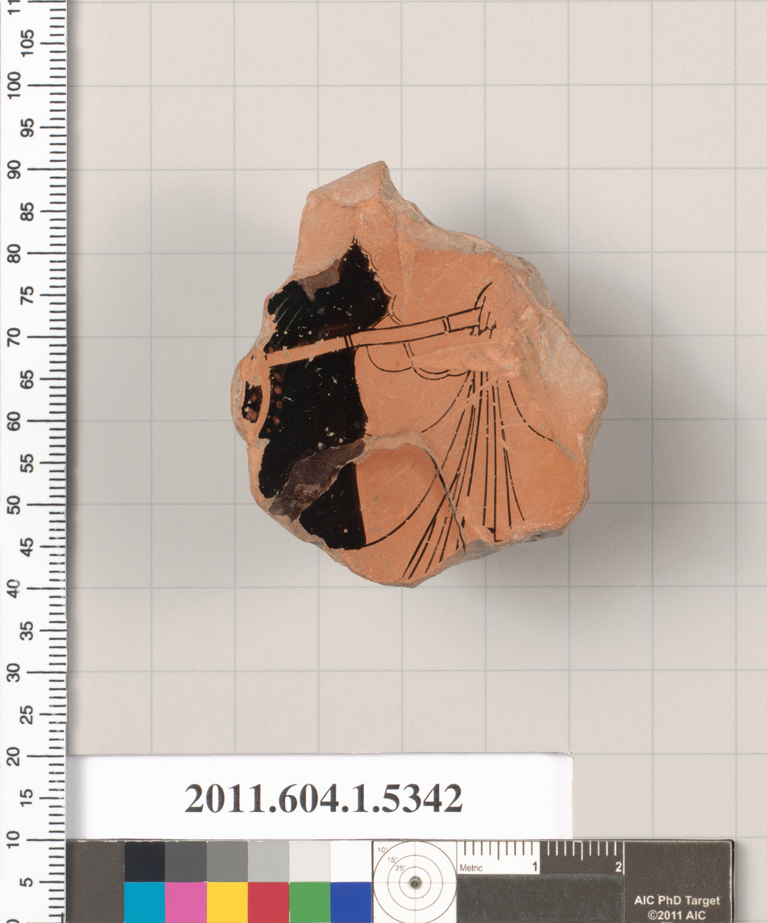 Terracotta fragment of a kylix (drinking cup)