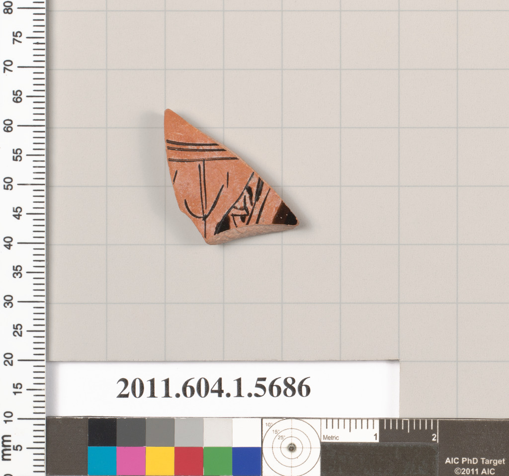 Terracotta fragment of a kylix (drinking cup)