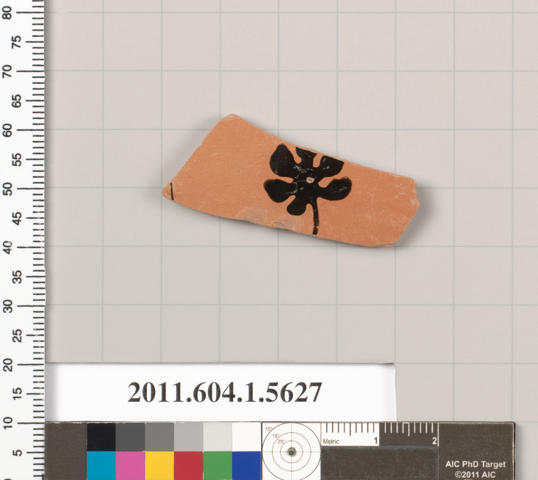 Terracotta fragment of a kylix (drinking cup)