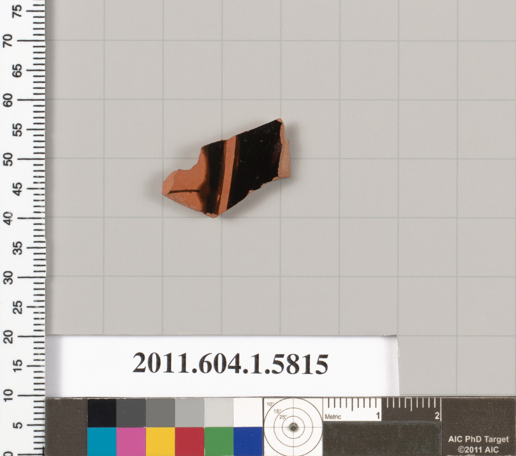 Terracotta fragment of a kylix: eye-cup  (drinking cup)