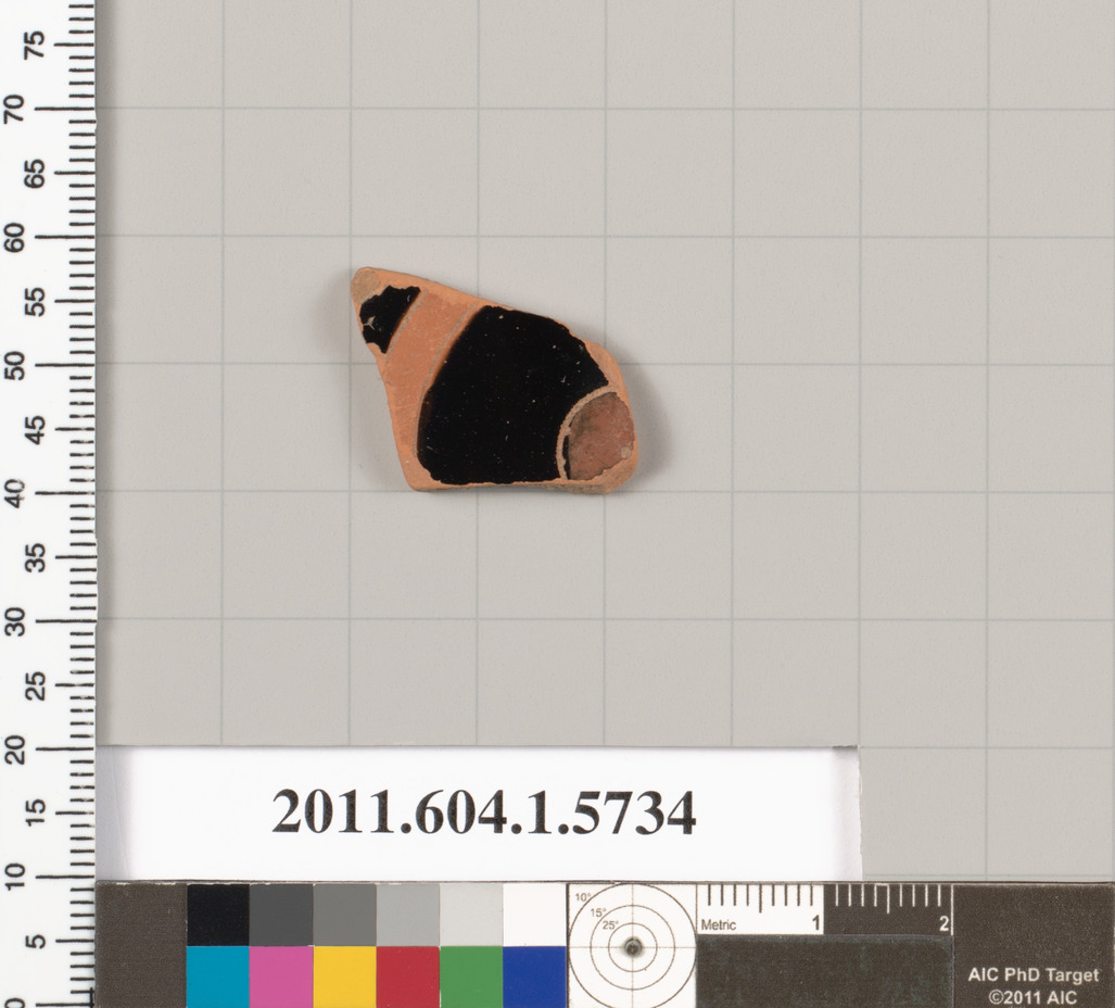 Terracotta fragment of a kylix: eye-cup  (drinking cup)