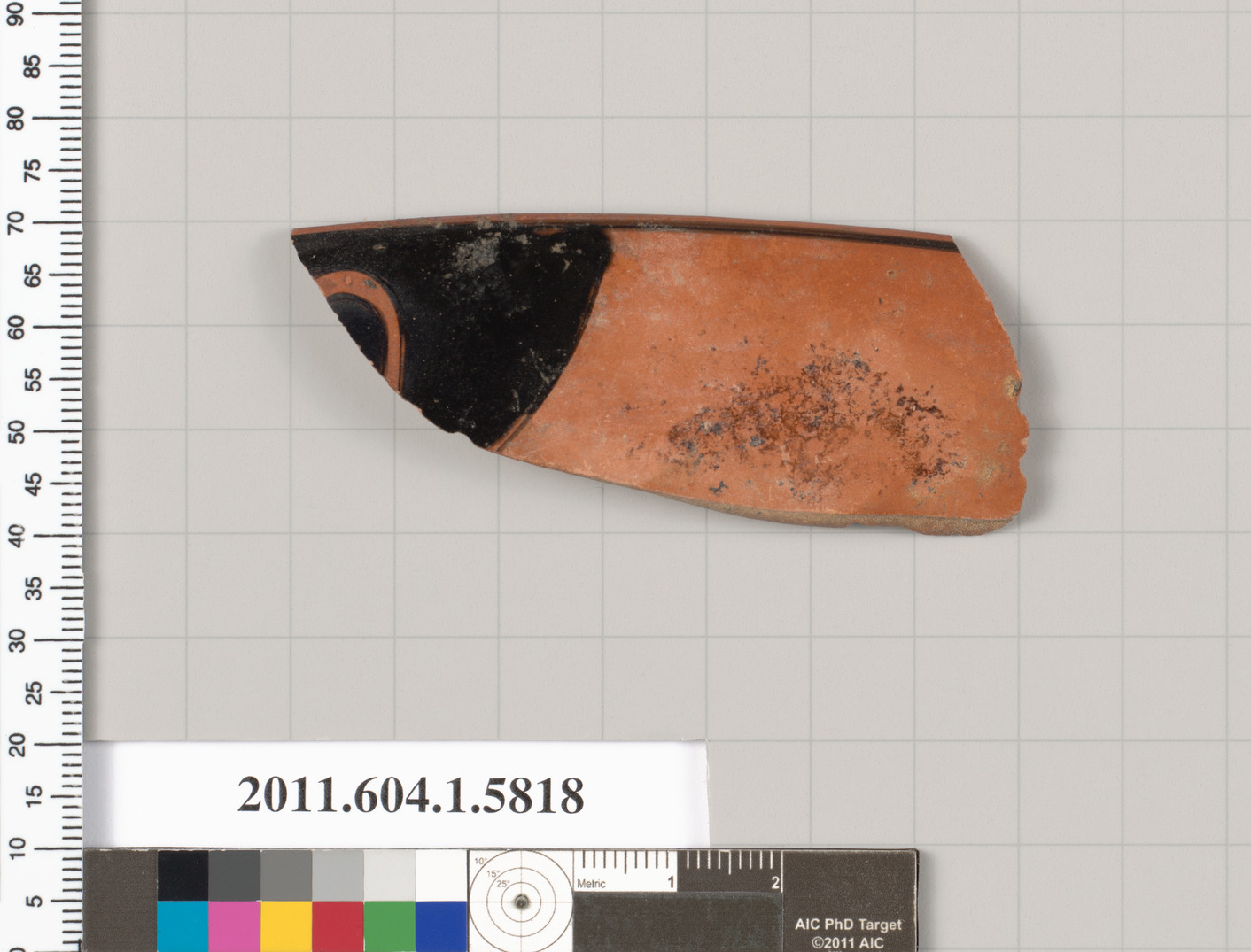 Terracotta rim fragment of a kylix: eye-cup (drinking cup)