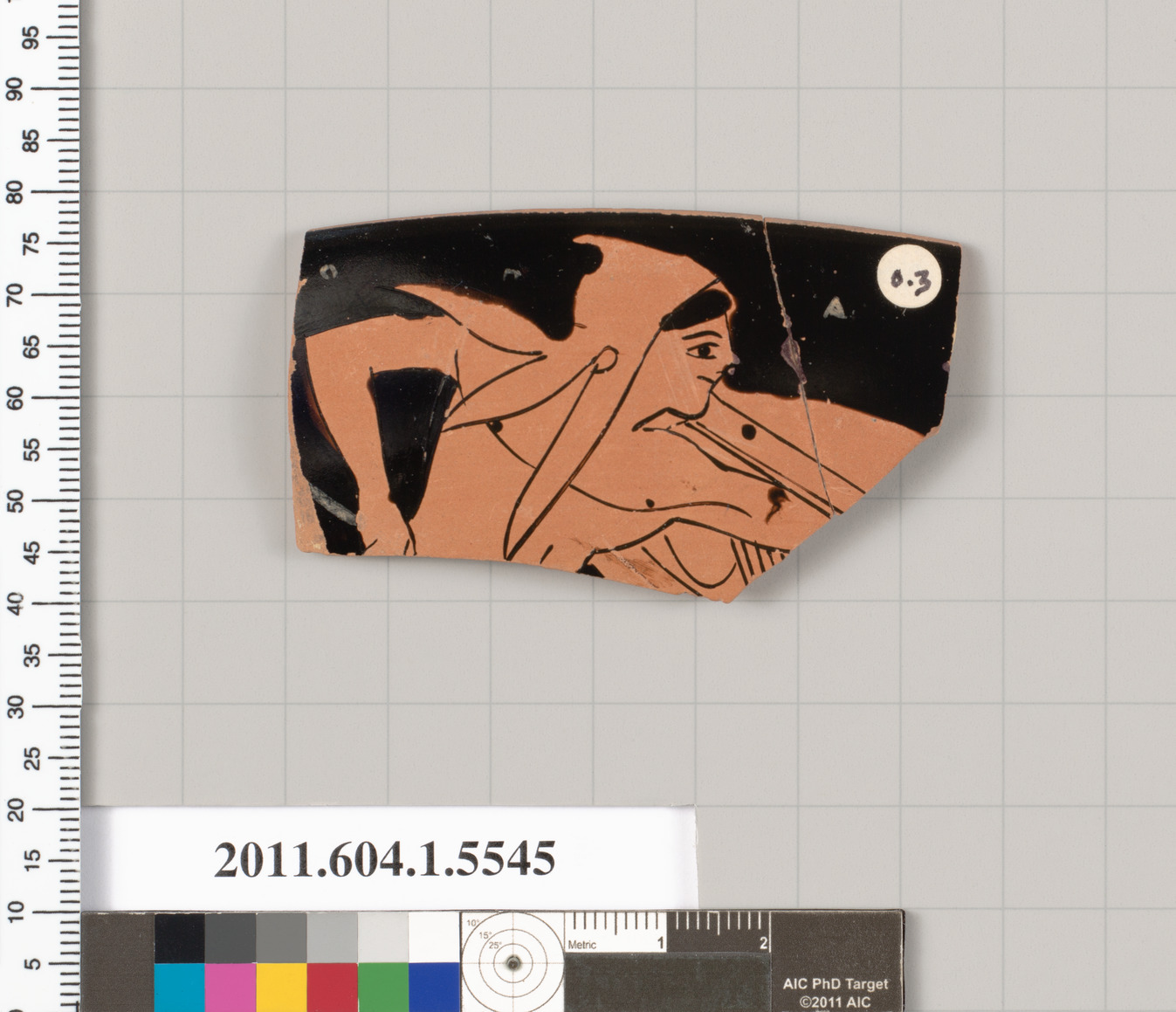 Terracotta rim fragment of a kylix (drinking cup)