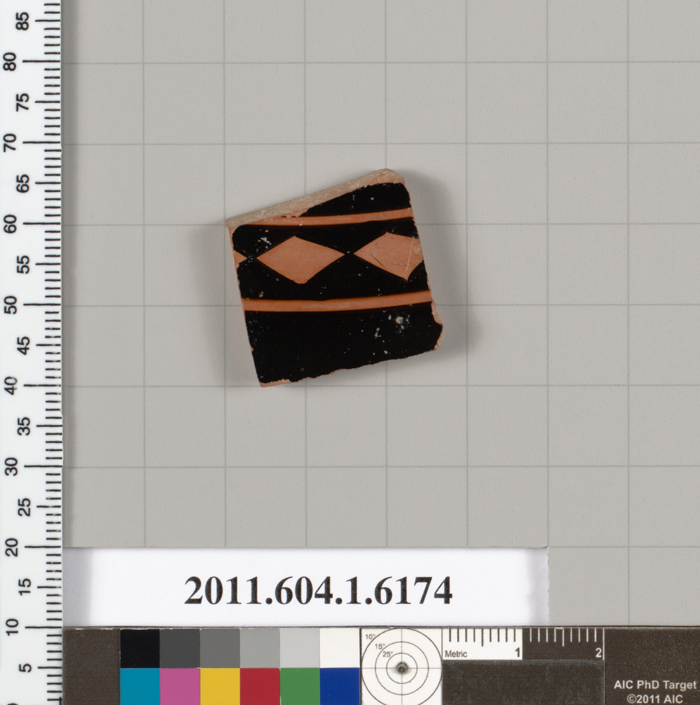 Terracotta fragment of a kylix (drinking cup)