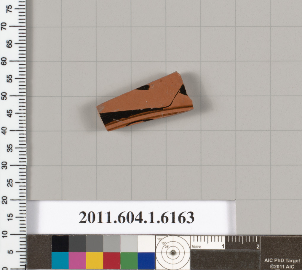 Terracotta fragment of a kylix (drinking cup)