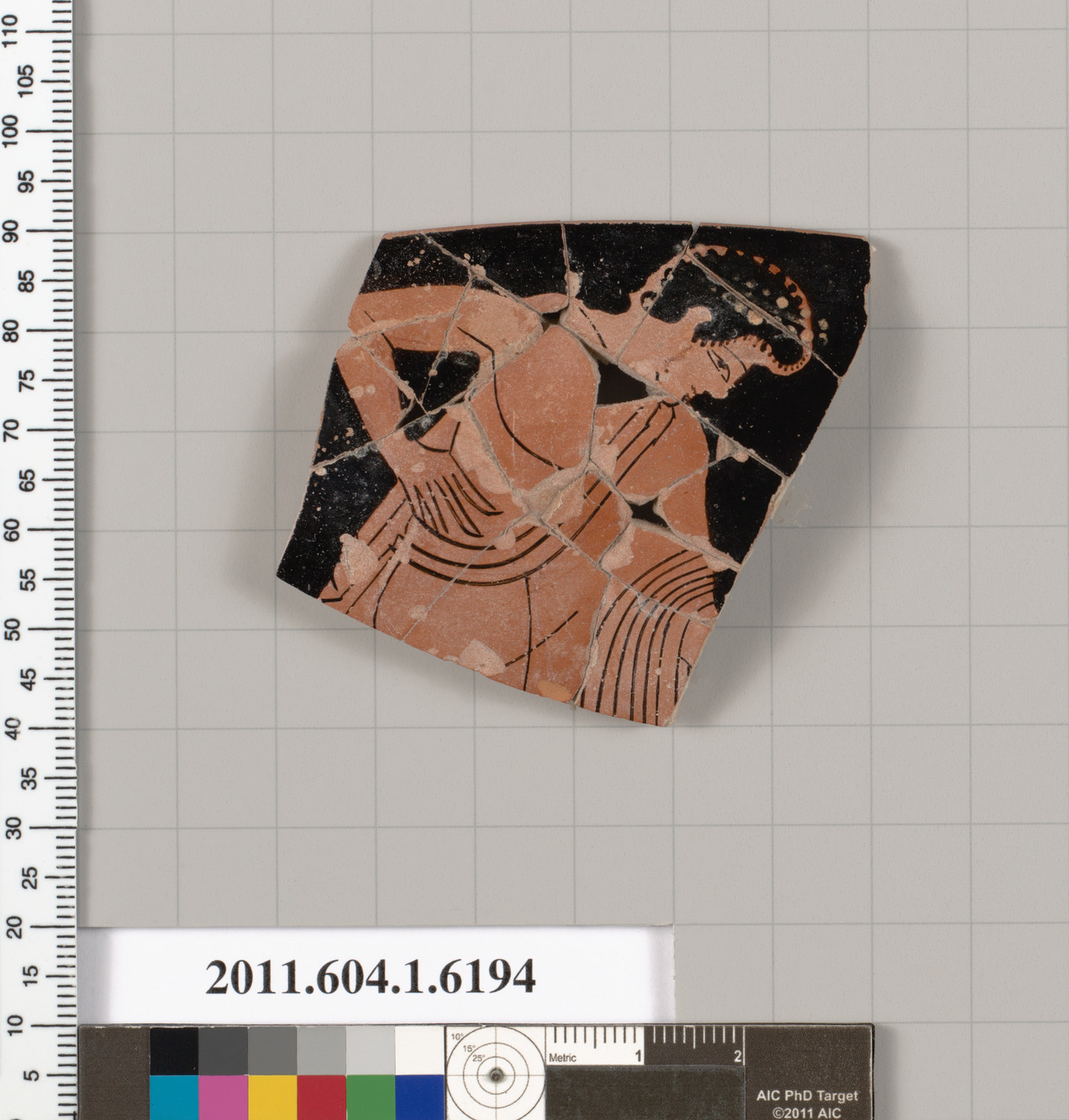 Terracotta rim fragment of a kylix (drinking cup)