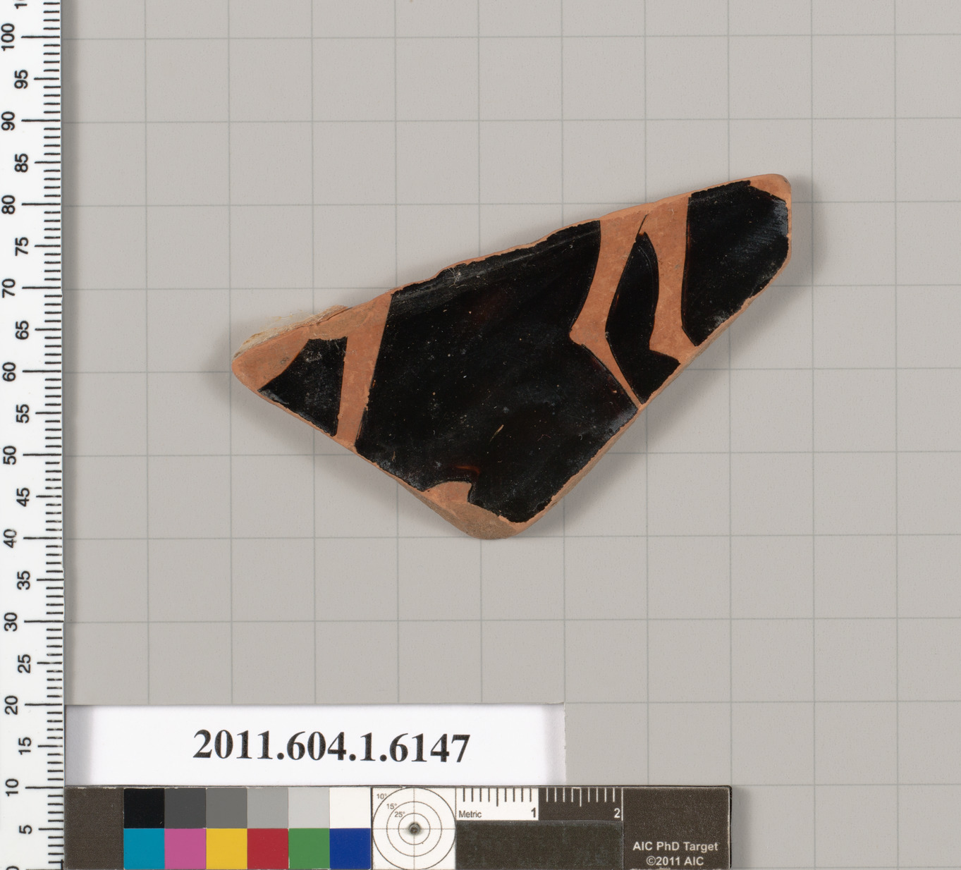 Terracotta fragment of a kylix (drinking cup)