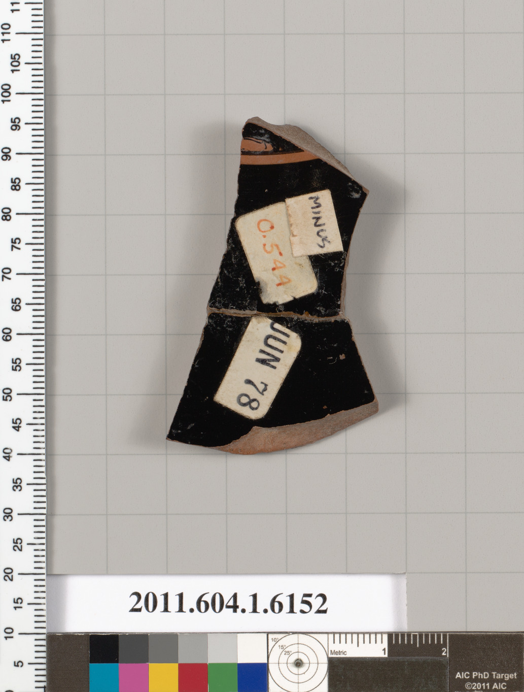 Terracotta fragment of a kylix (drinking cup)