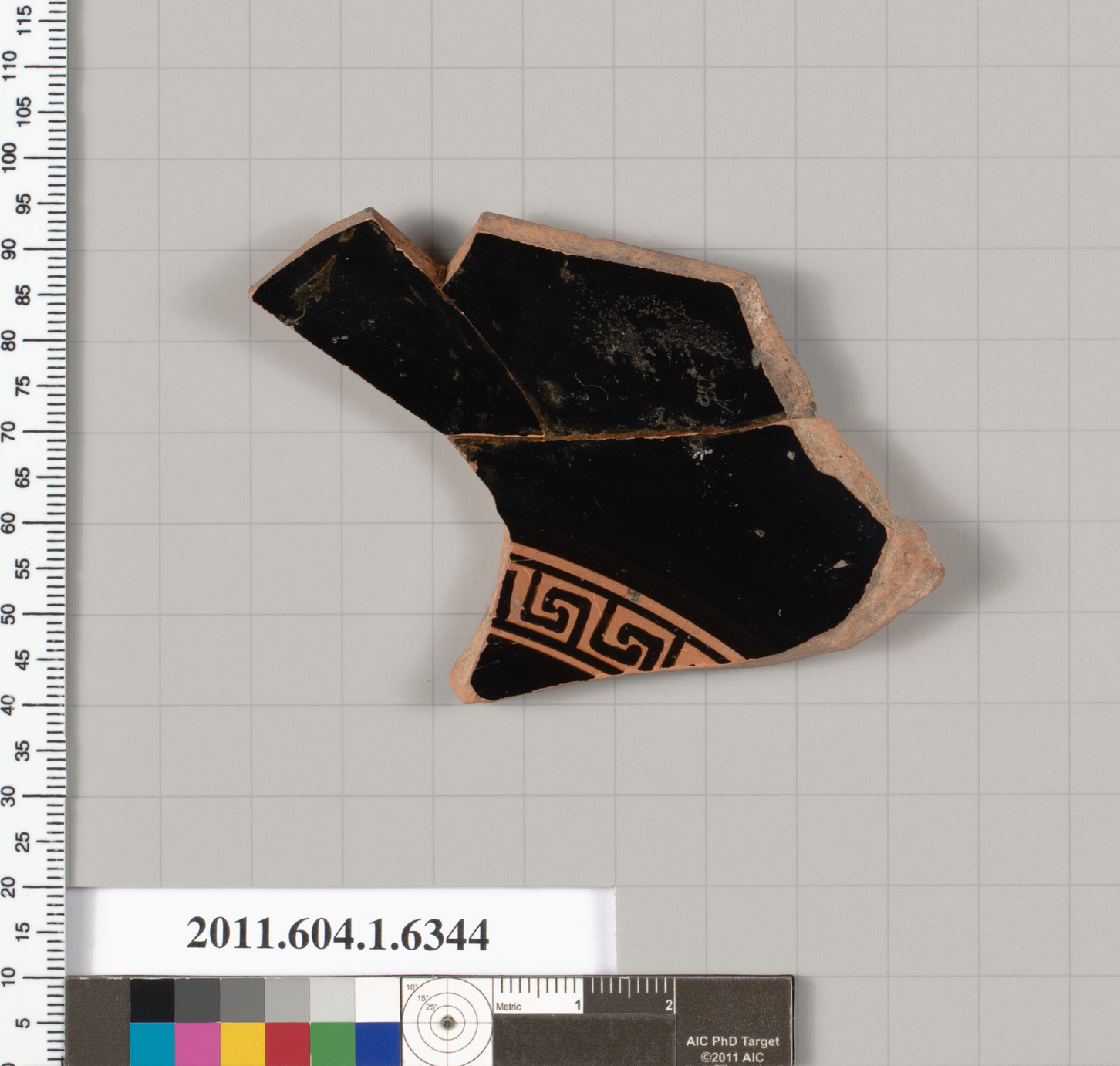 Terracotta fragment of a kylix (drinking cup)