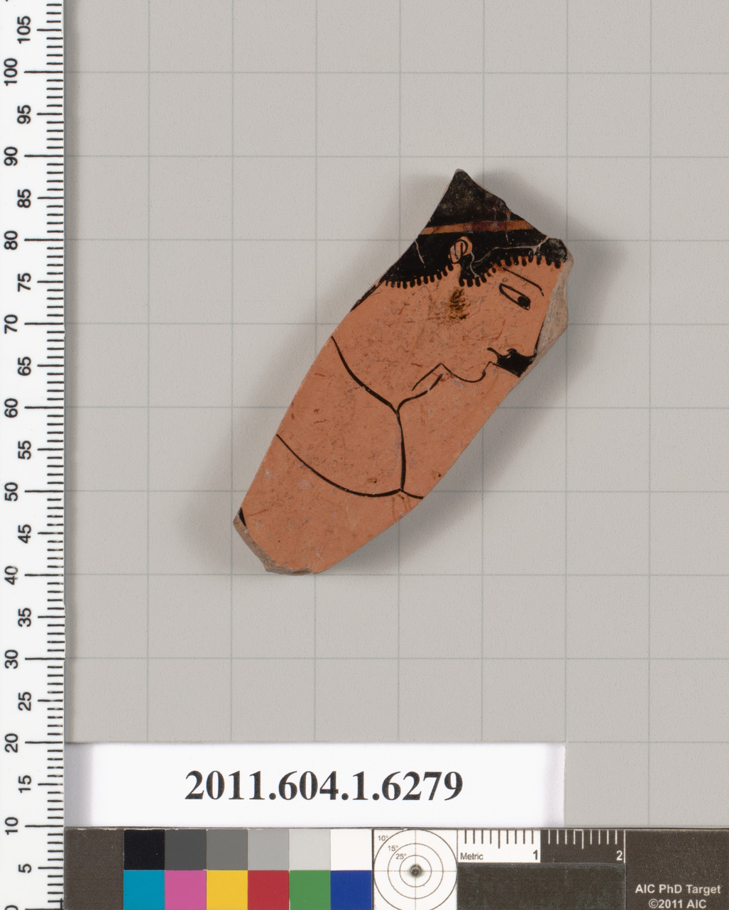 Terracotta fragment of a kylix (drinking cup)