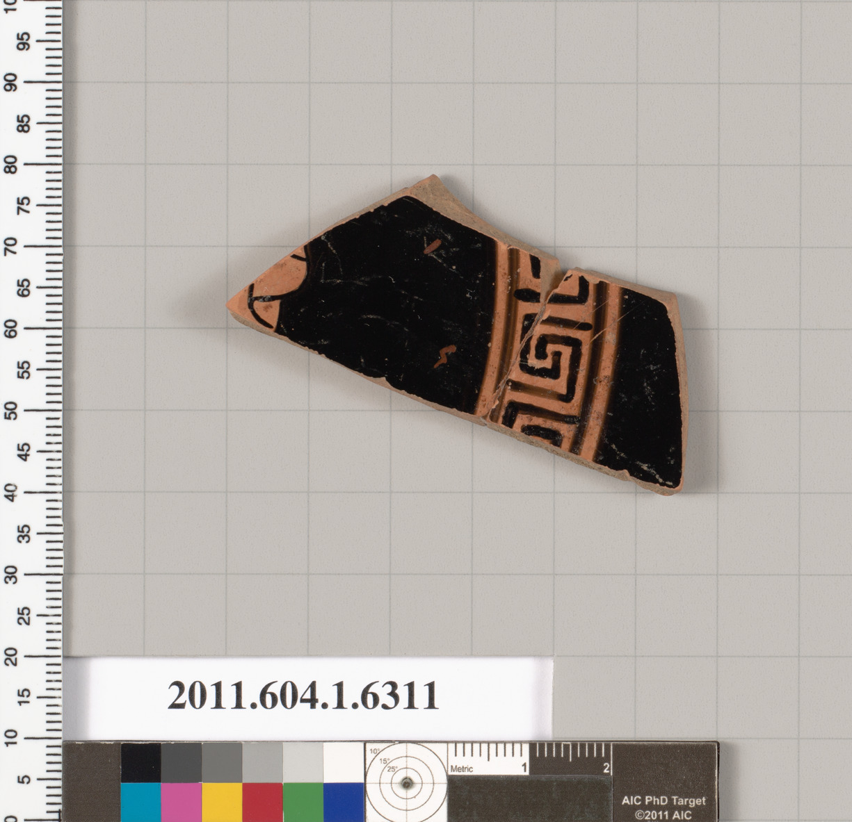 Terracotta fragment of a kylix (drinking cup)