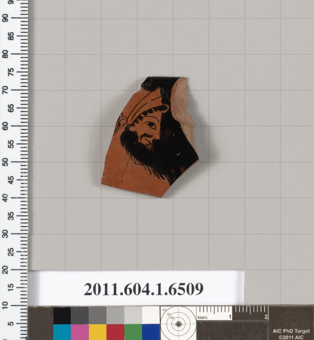 Terracotta rim fragment of a kylix (drinking cup)