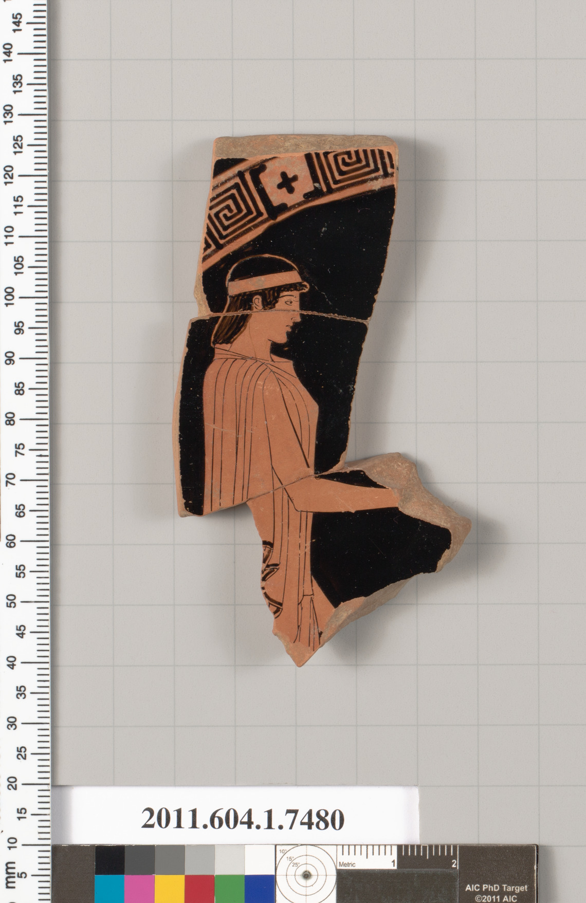 Terracotta fragment of a kylix (drinking cup)