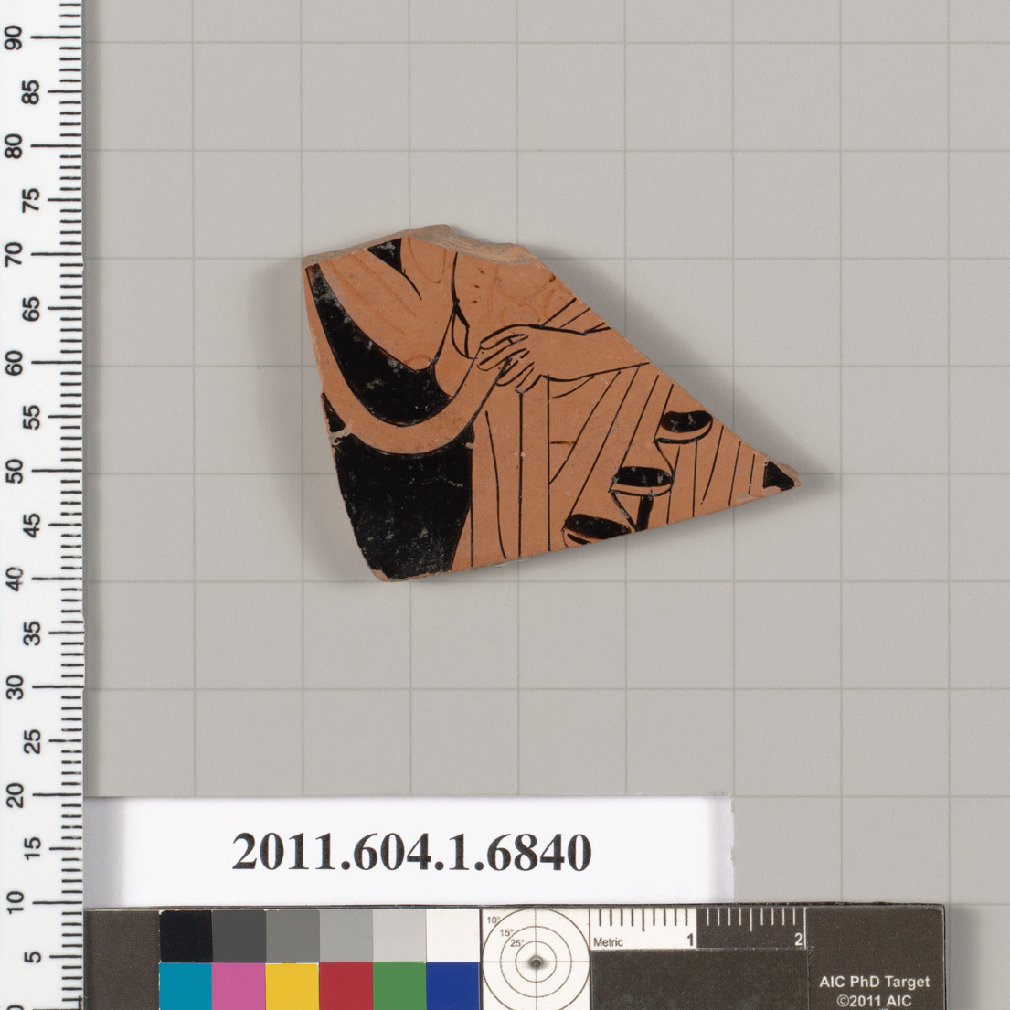 Terracotta fragment of a kylix (drinking cup)