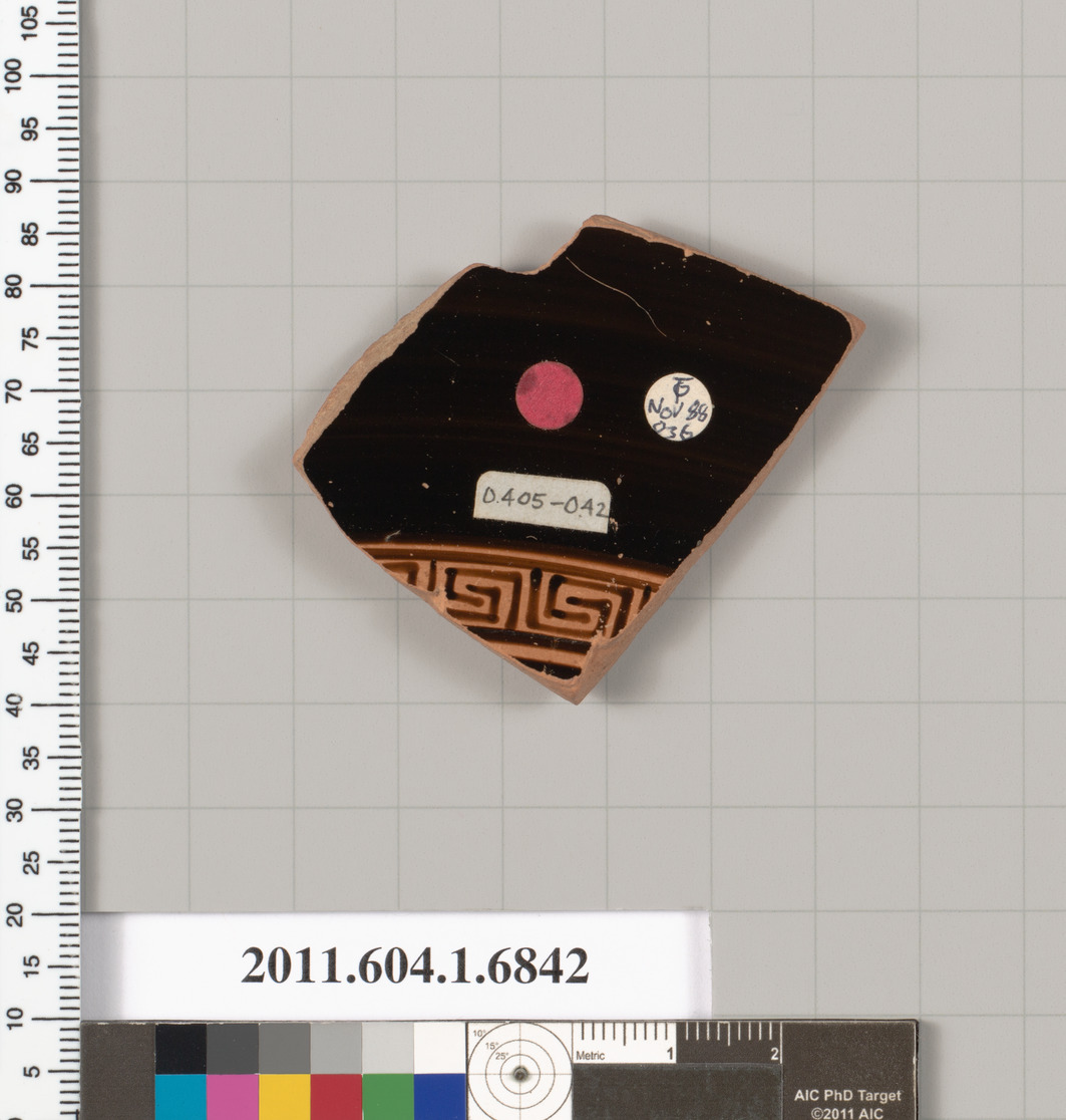 Terracotta fragment of a kylix (drinking cup)