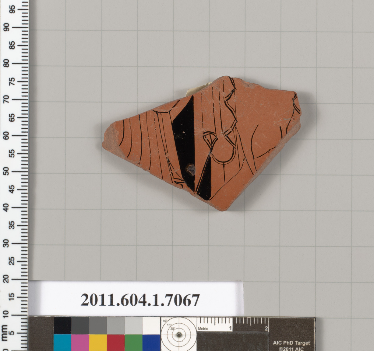 Terracotta fragment of a kylix (drinking cup)