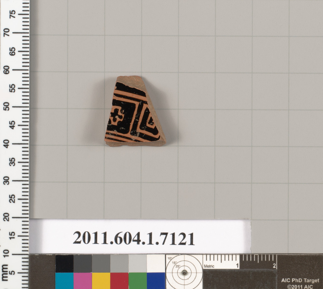 Terracotta fragment of a kylix (drinking cup)