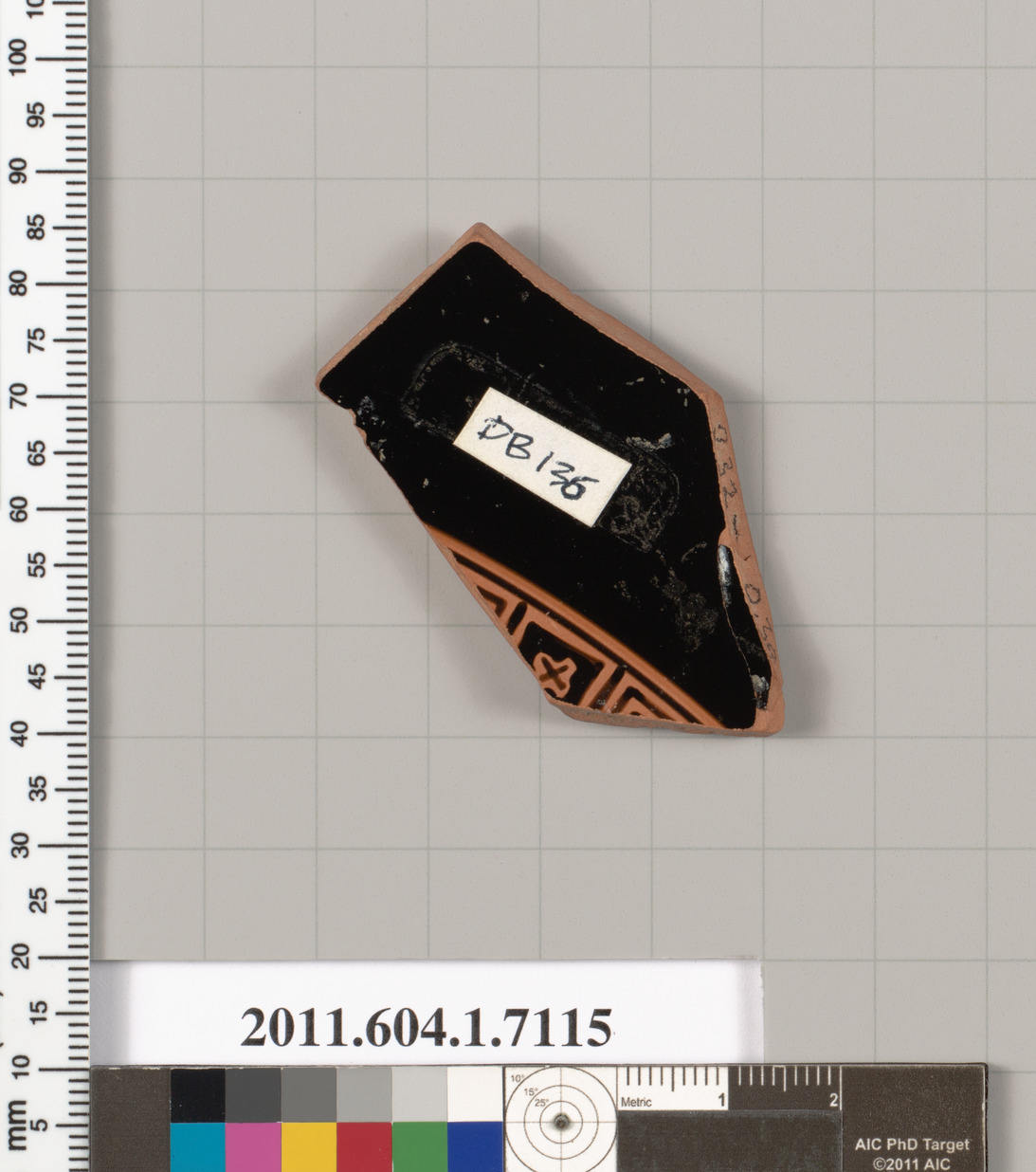 Terracotta fragment of a kylix (drinking cup)