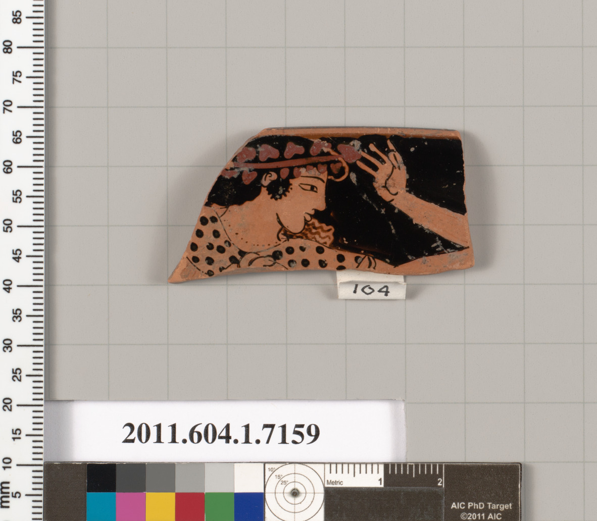 Terracotta rim fragment of a kylix (drinking cup)