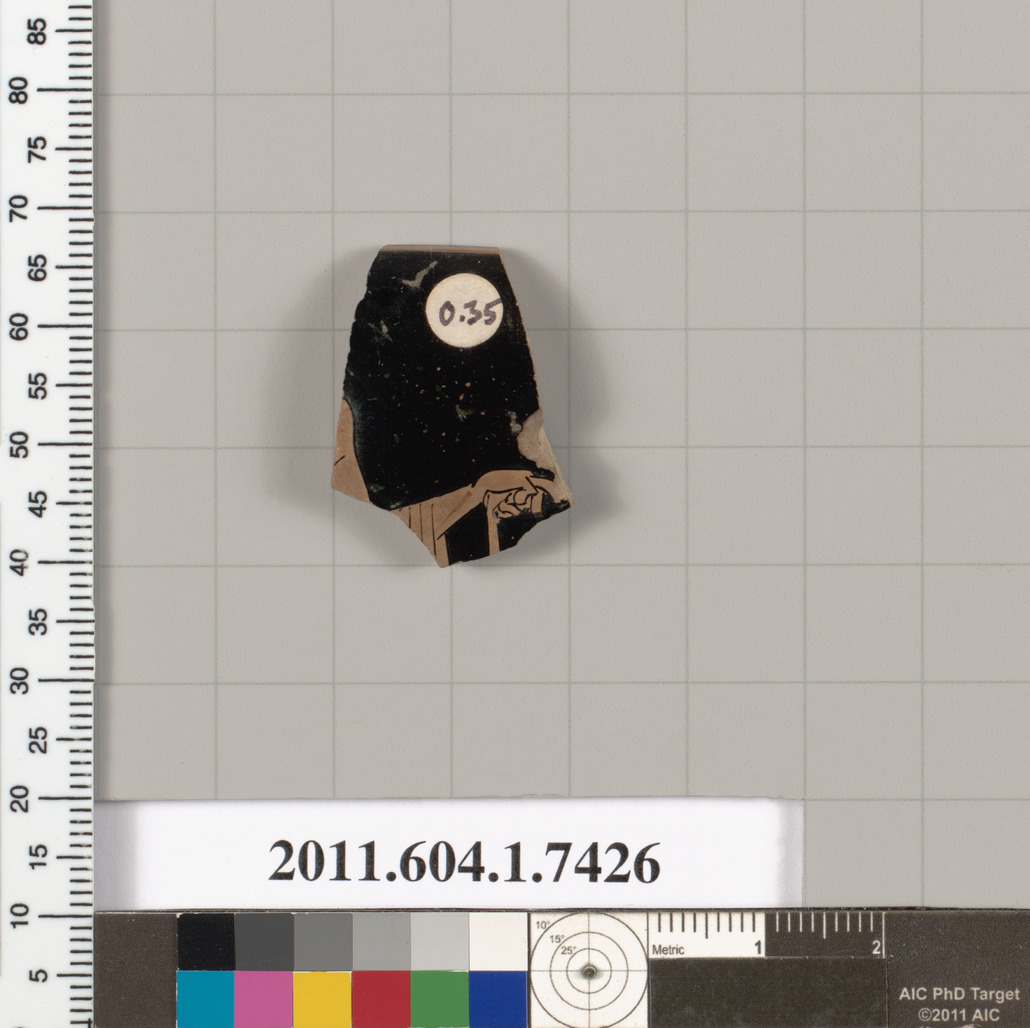 Terracotta rim fragment of a kylix (drinking cup)