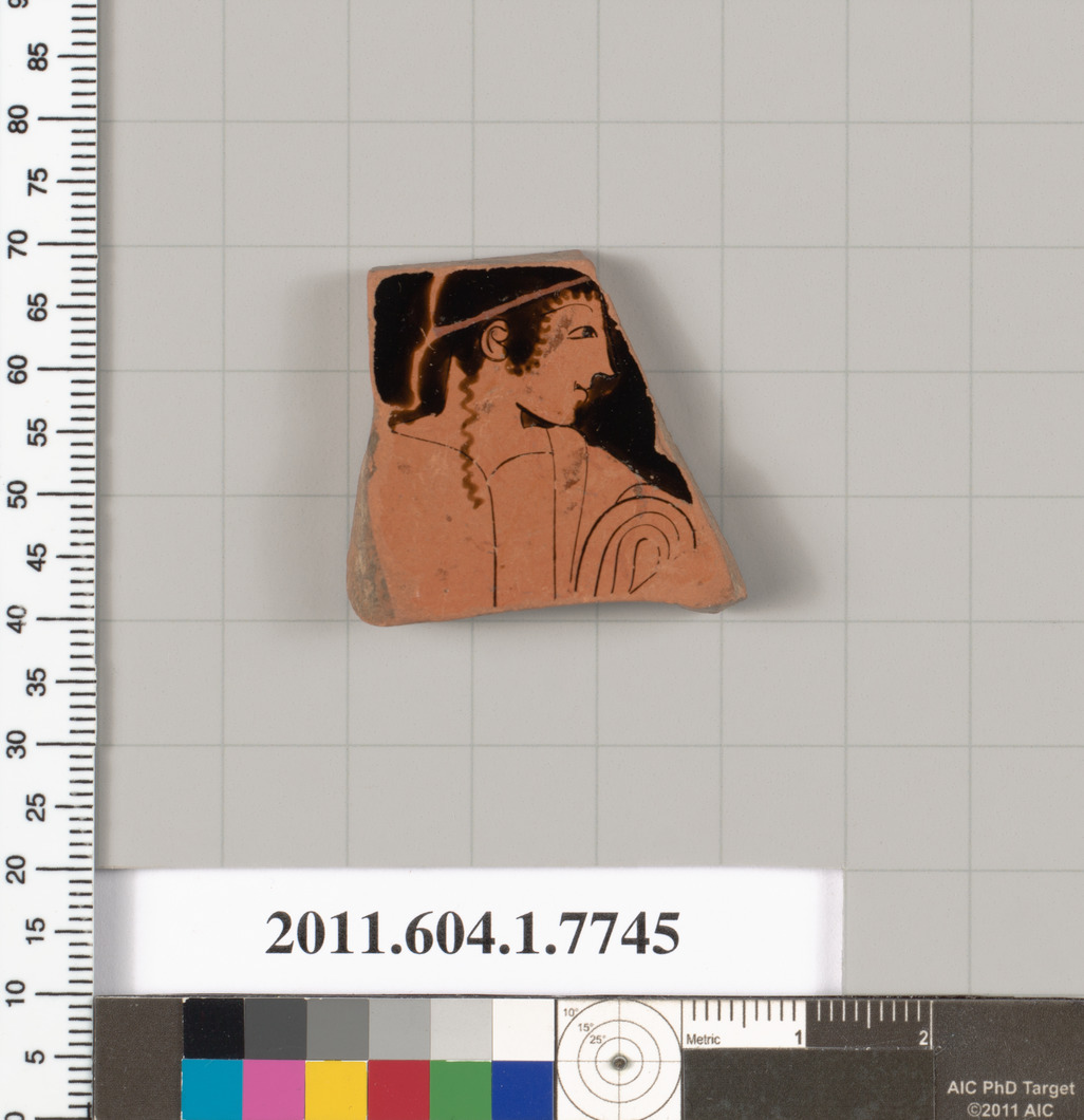 Terracotta fragment of a kylix (drinking cup)