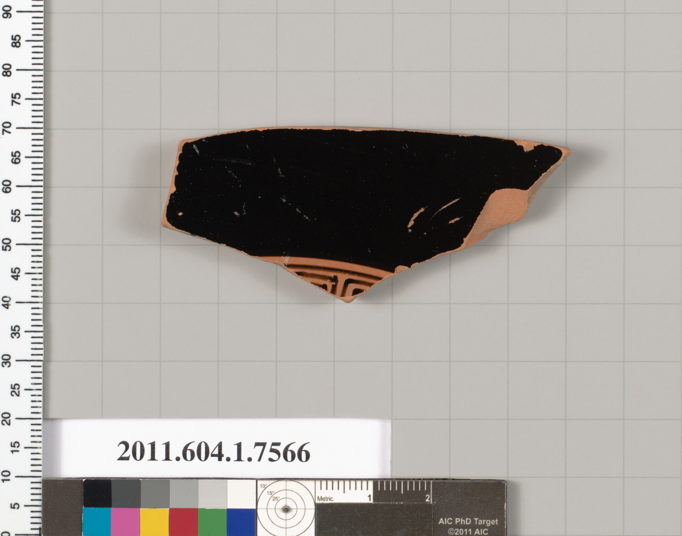 Terracotta fragment of a kylix (drinking cup)
