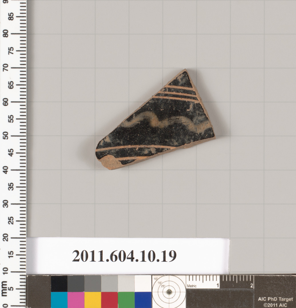 Terracotta fragment of a kylix (drinking cup)