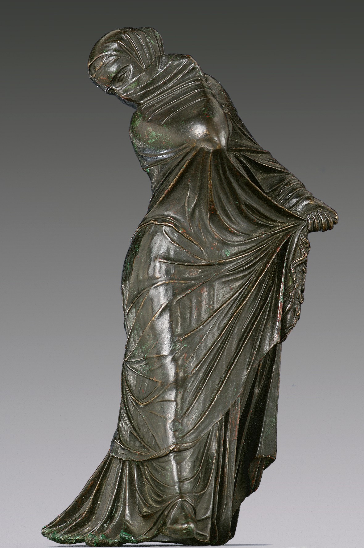 Bronze Statuette Of A Veiled And Masked Dancer Greek Hellenistic 