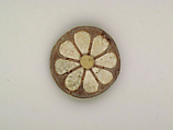 Roundel with daisy pattern, Clay, glazed