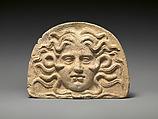 Antefix, head of Medusa, Terracotta, Greek, South Italian