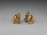 Gold and copper alloy spiral earring with lion-griffin head terminal, Gold, Greek, Cypriot